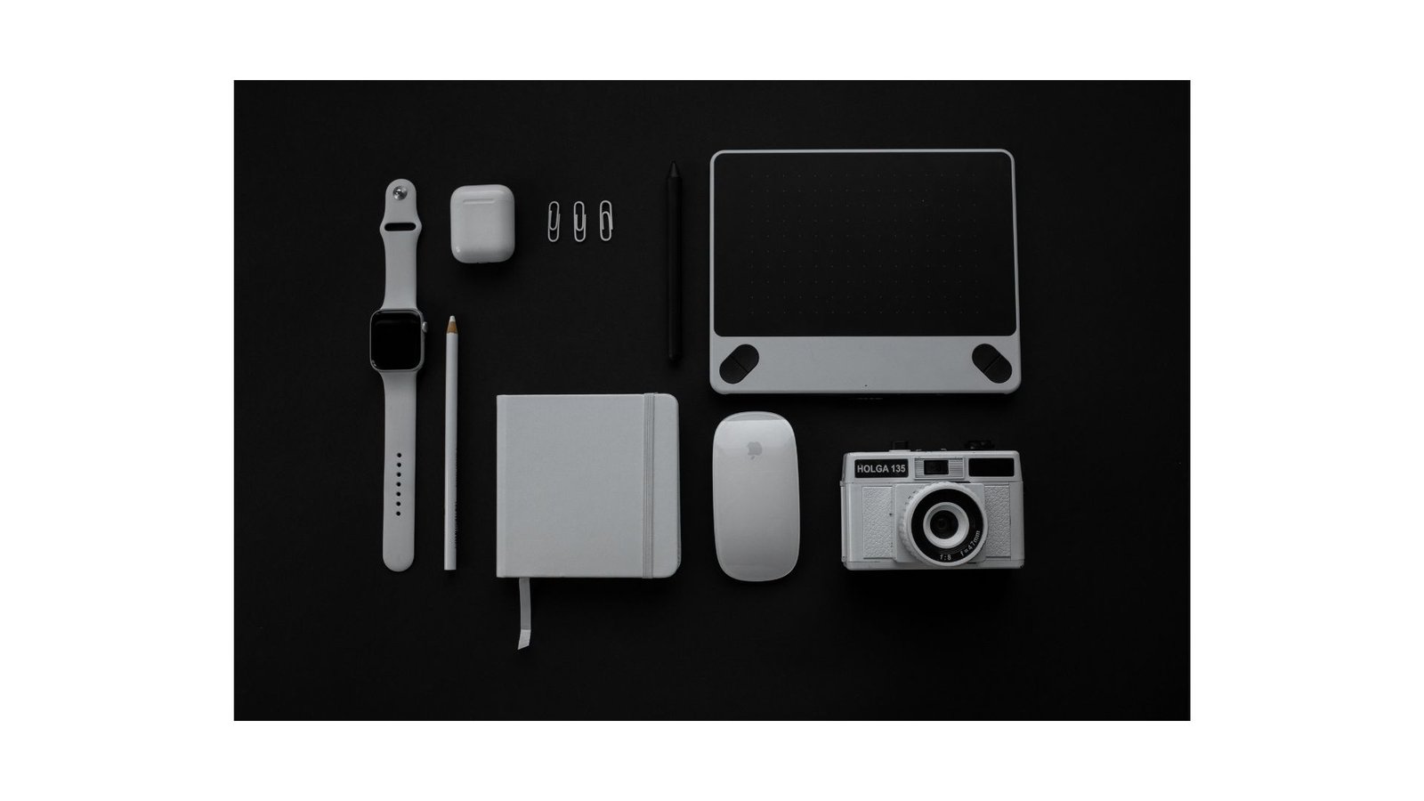 Small electronics and gadgets arranged flat
