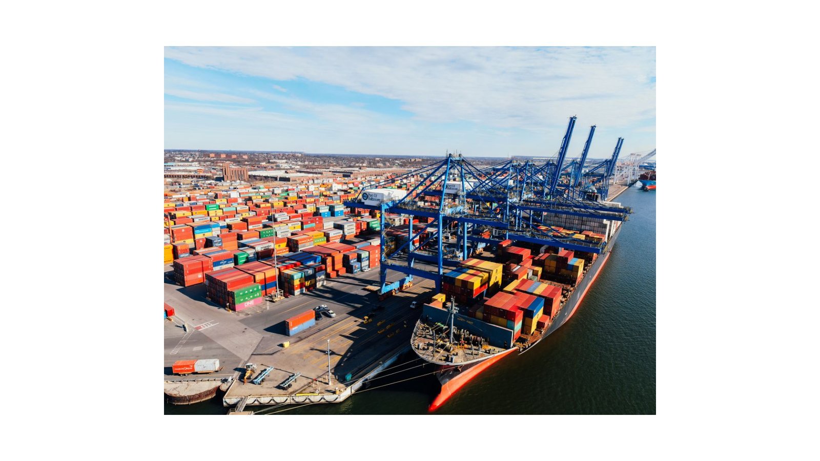 Stacked shipping containers at a trade port